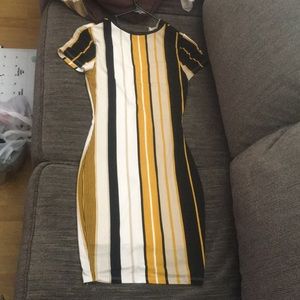 Knee length dress, tight.